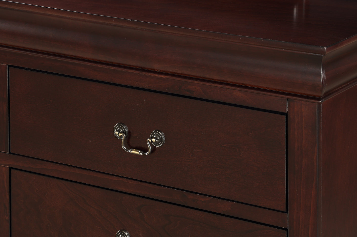 Rich mahogany dresser with ornate brass drawer pull