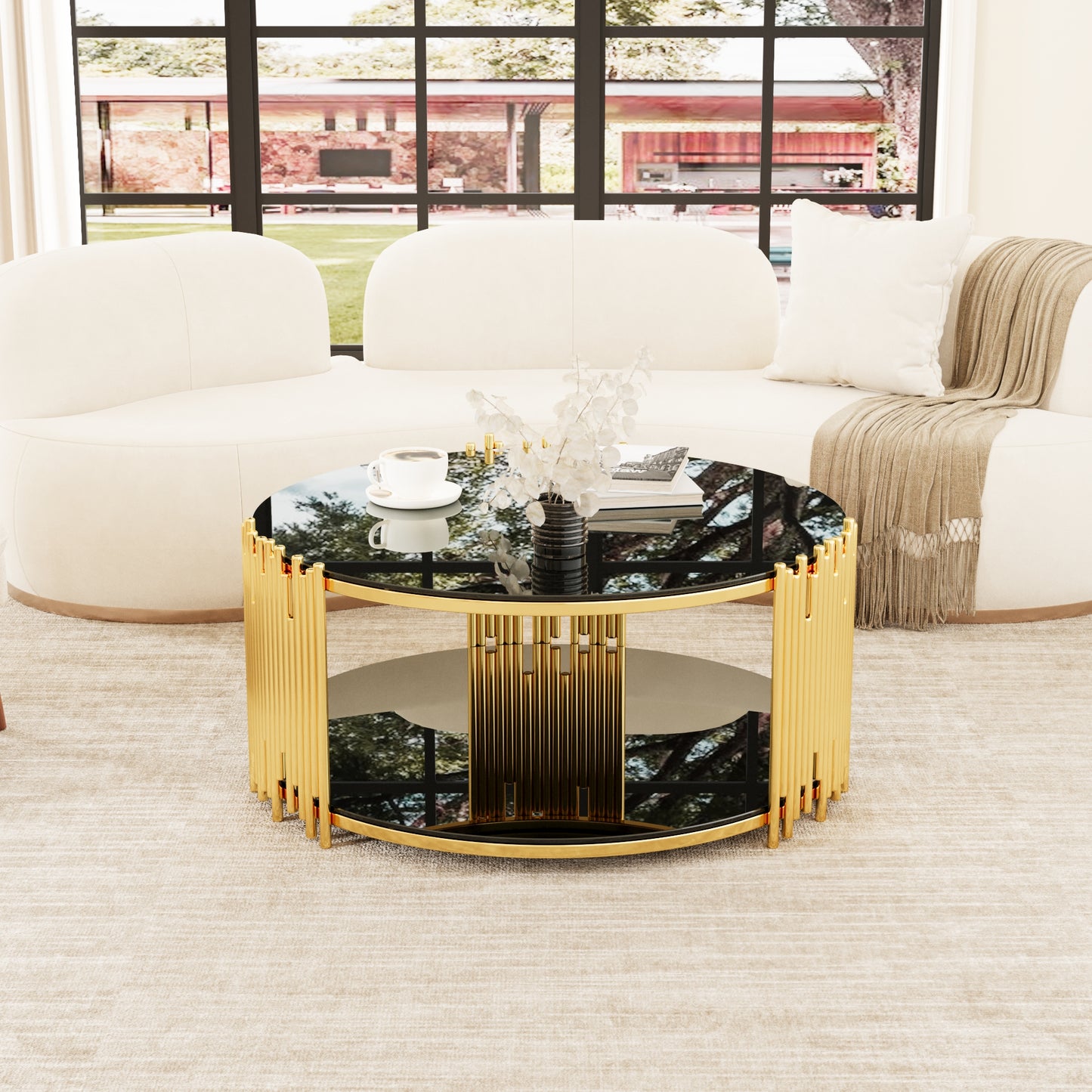 Round glass coffee table with fluted gold base