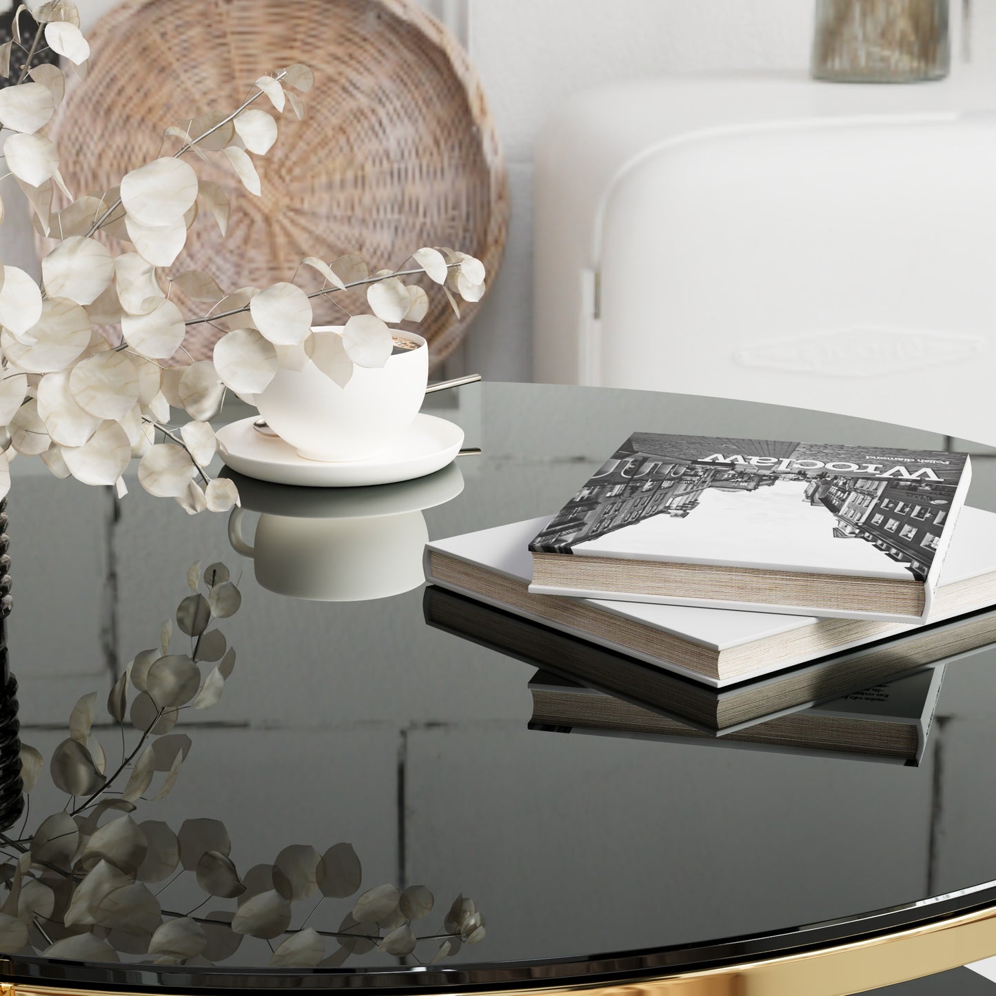 White ceramic coffee cup and saucer on a reflective table