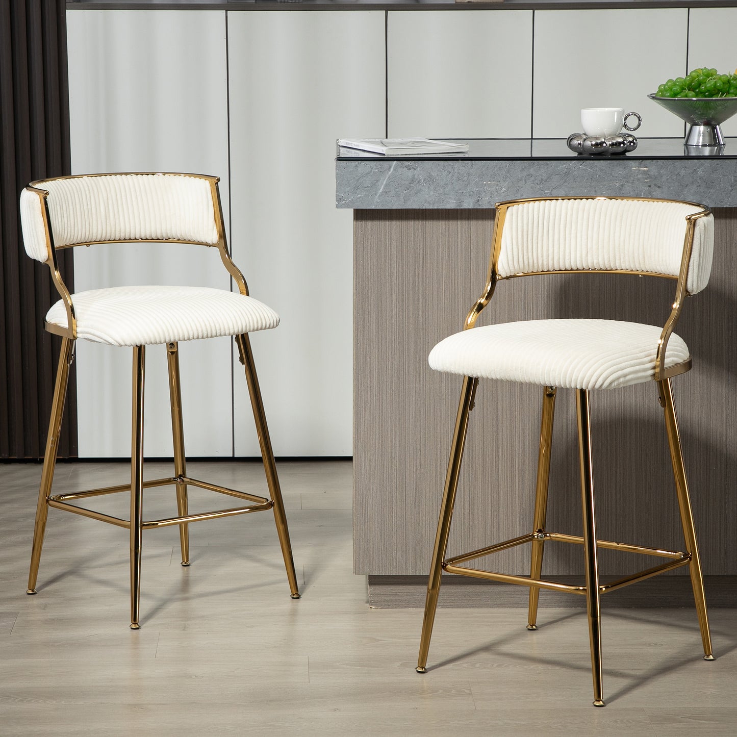 White velvet channeltufted bar stool with polished gold legs