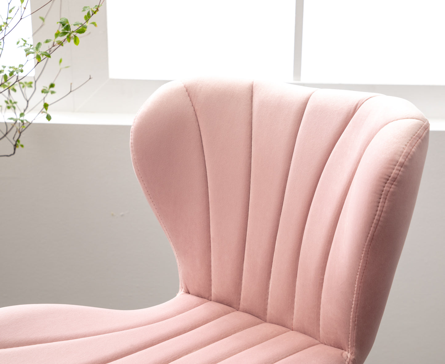 Pink velvet accent chair with channel tufting
