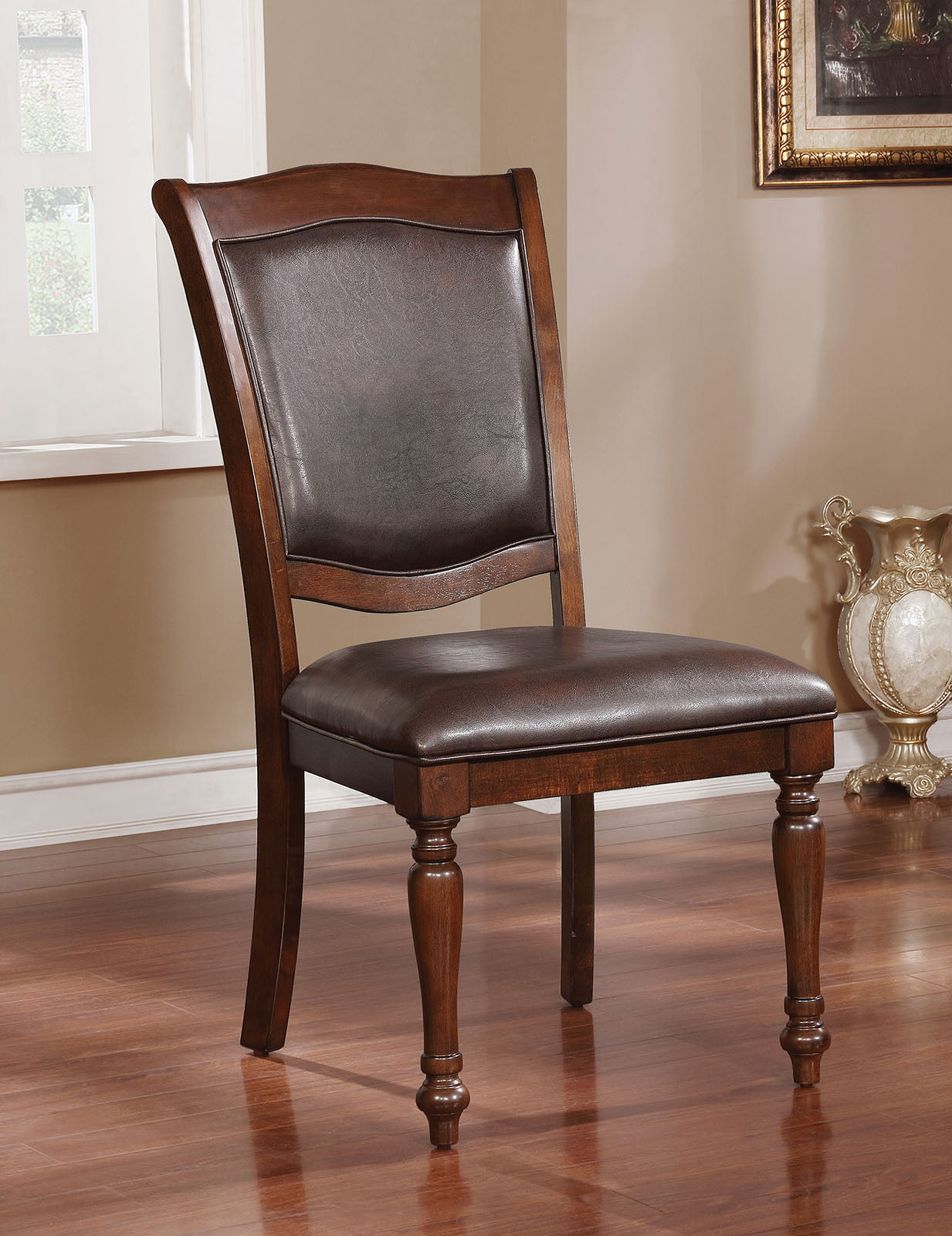 Classic dark brown leather upholstered wooden dining chair with turned legs