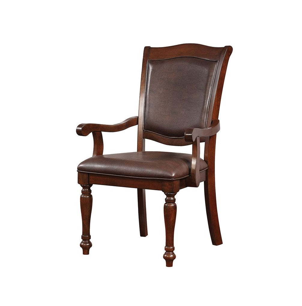 Brown leather upholstered arm chair with carved wood frame