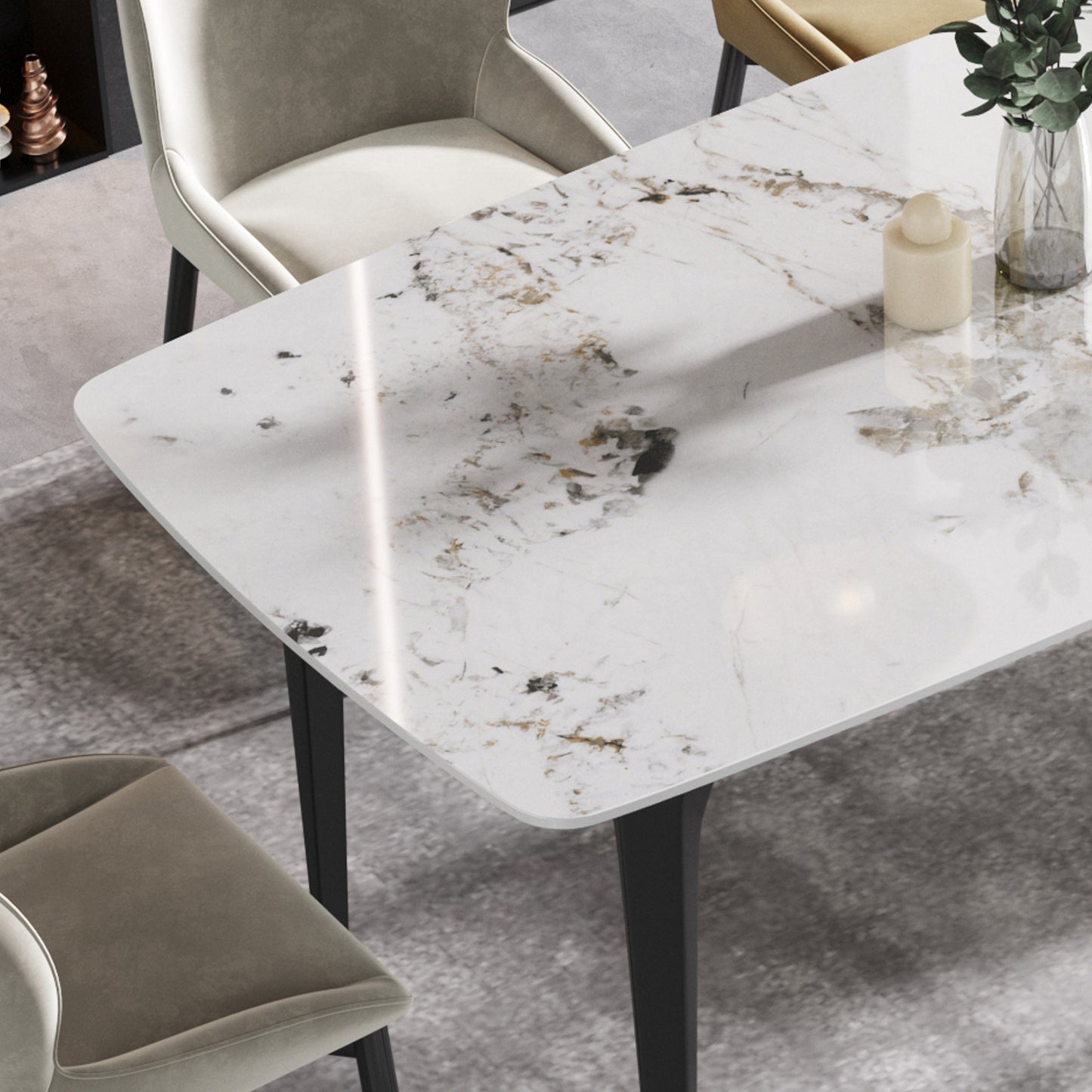 Modern white marble dining table with black legs and subtle gold veining