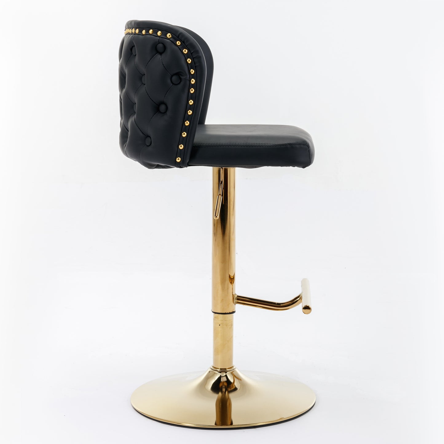 Black tufted bar stool with gold base and brass nailhead trim