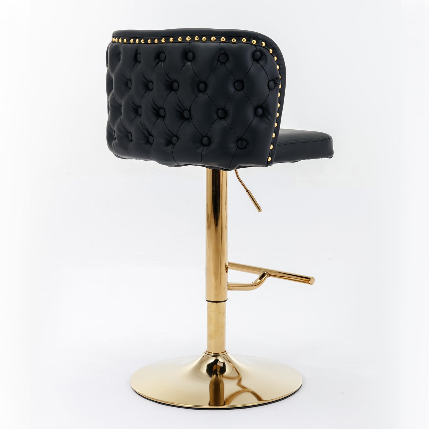 Black tufted vinyl bar stool with gold adjustable base and footrest
