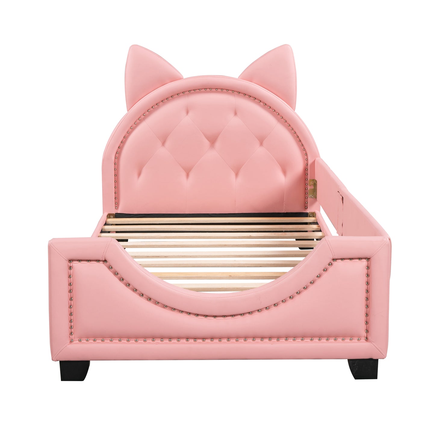 Pink upholstered twin bed with cat ear headboard and studded trim