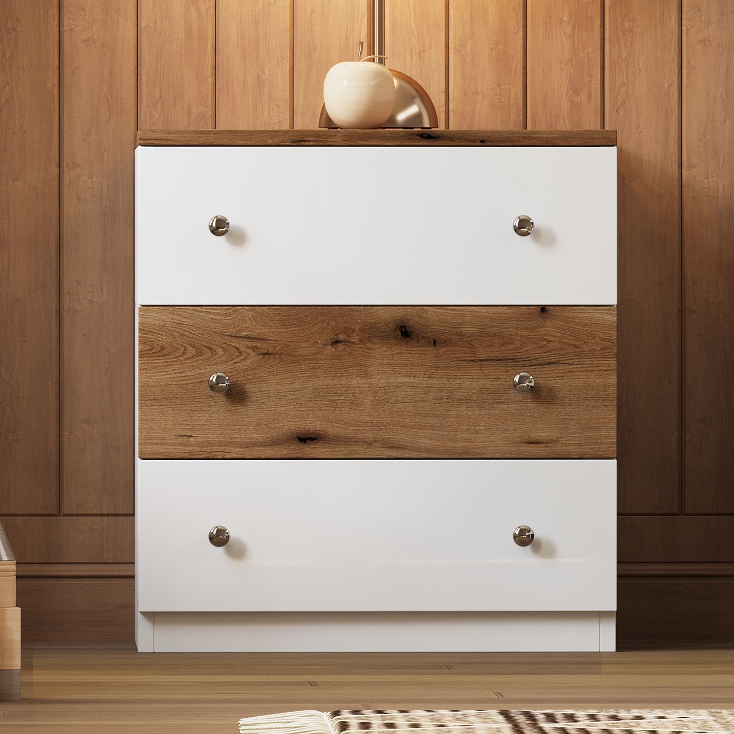 White dresser with a distressed wood drawer front and silver knobs