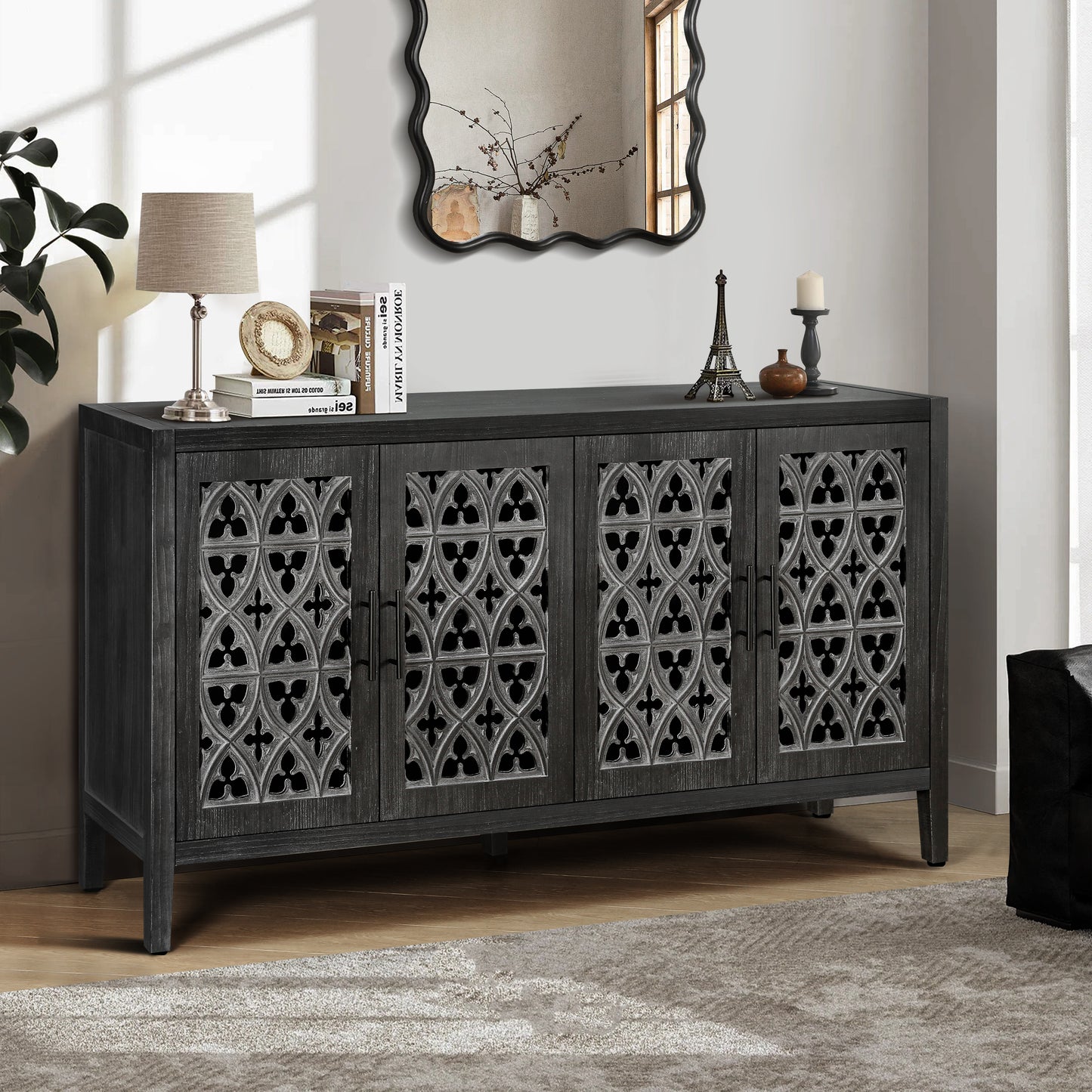 Dark wood sideboard with ornate metal door fronts