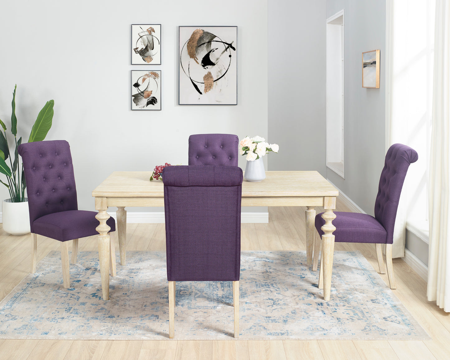 Tufted purple upholstered dining chair with a light wood frame and carved legs