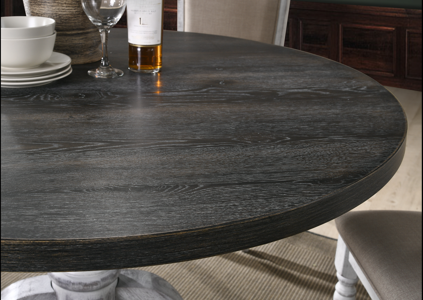 Dark gray distressed wood dining table with textured grain