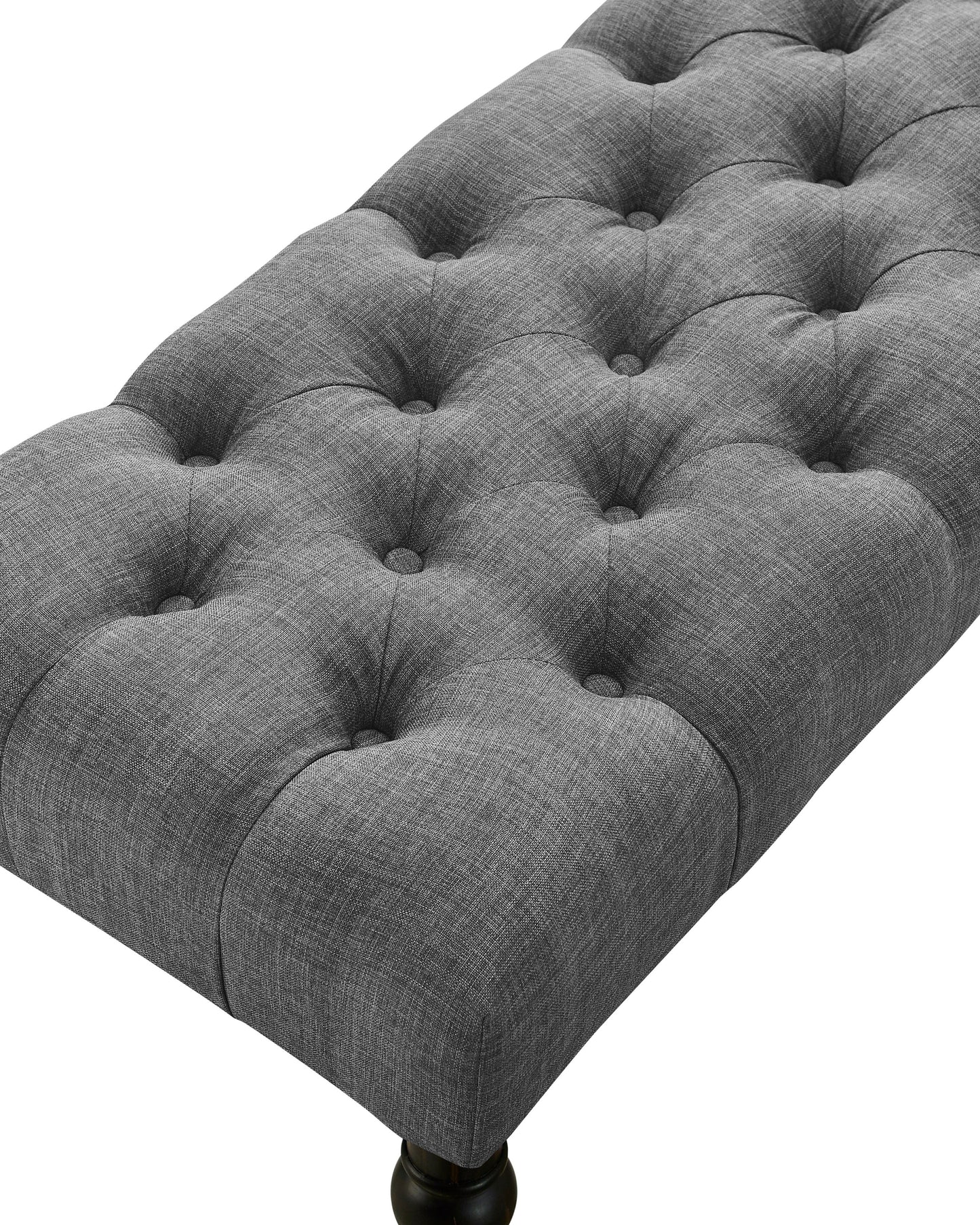 Grey linen tufted bench with dark wooden legs