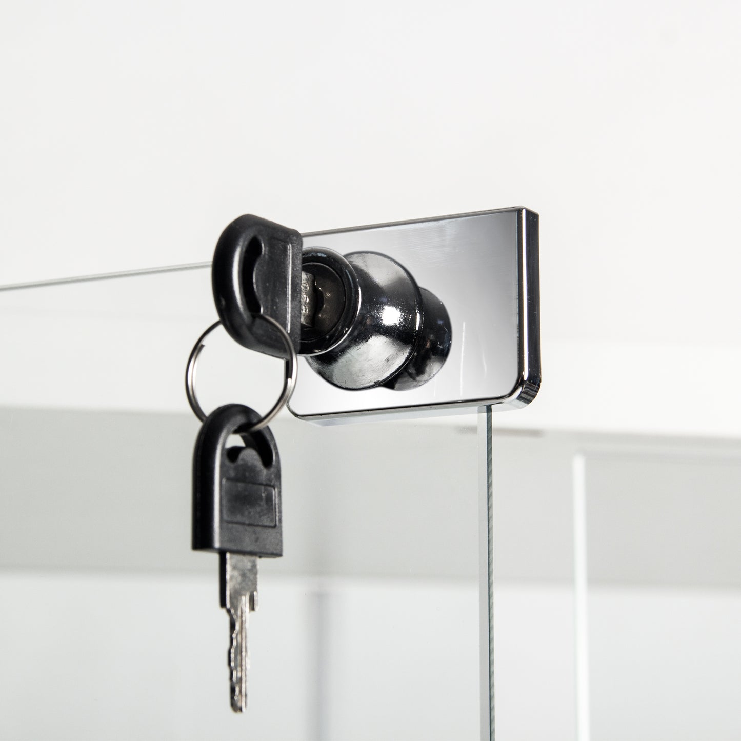 Chrome cabinet lock with two black keys