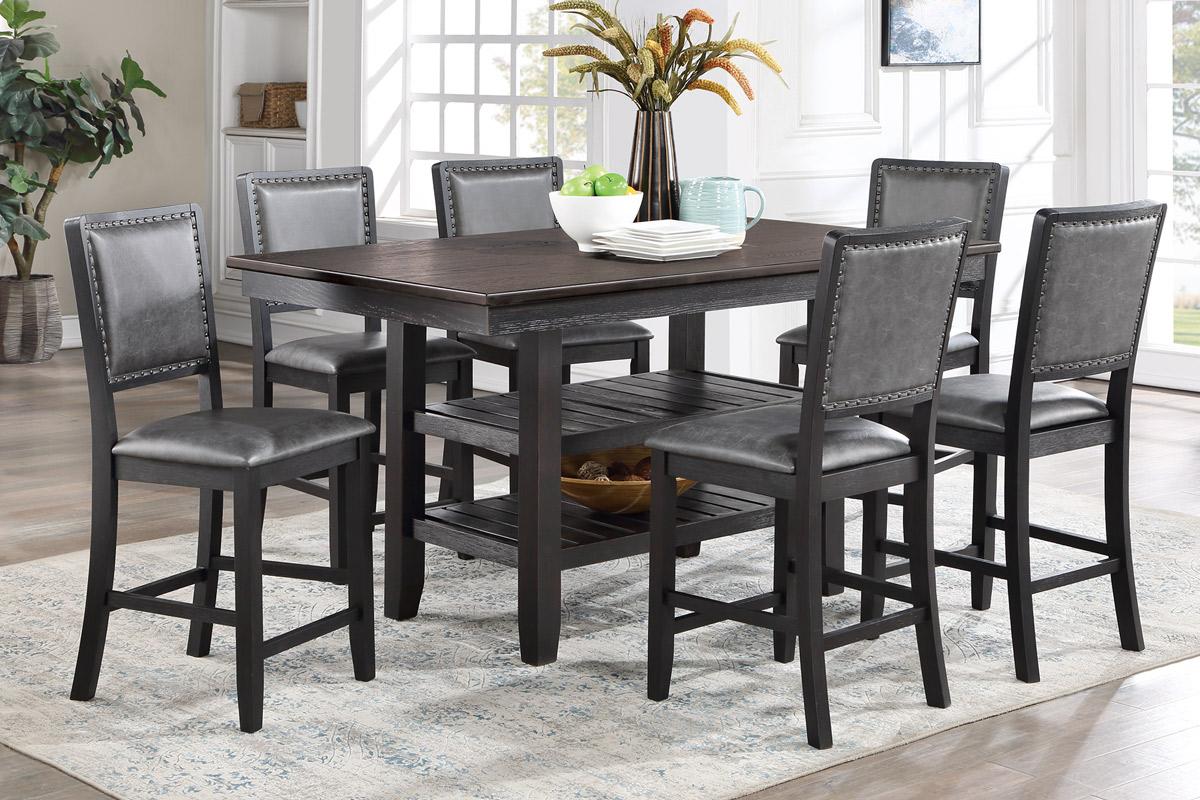 Dark wood counter height dining table with upholstered grey chairs