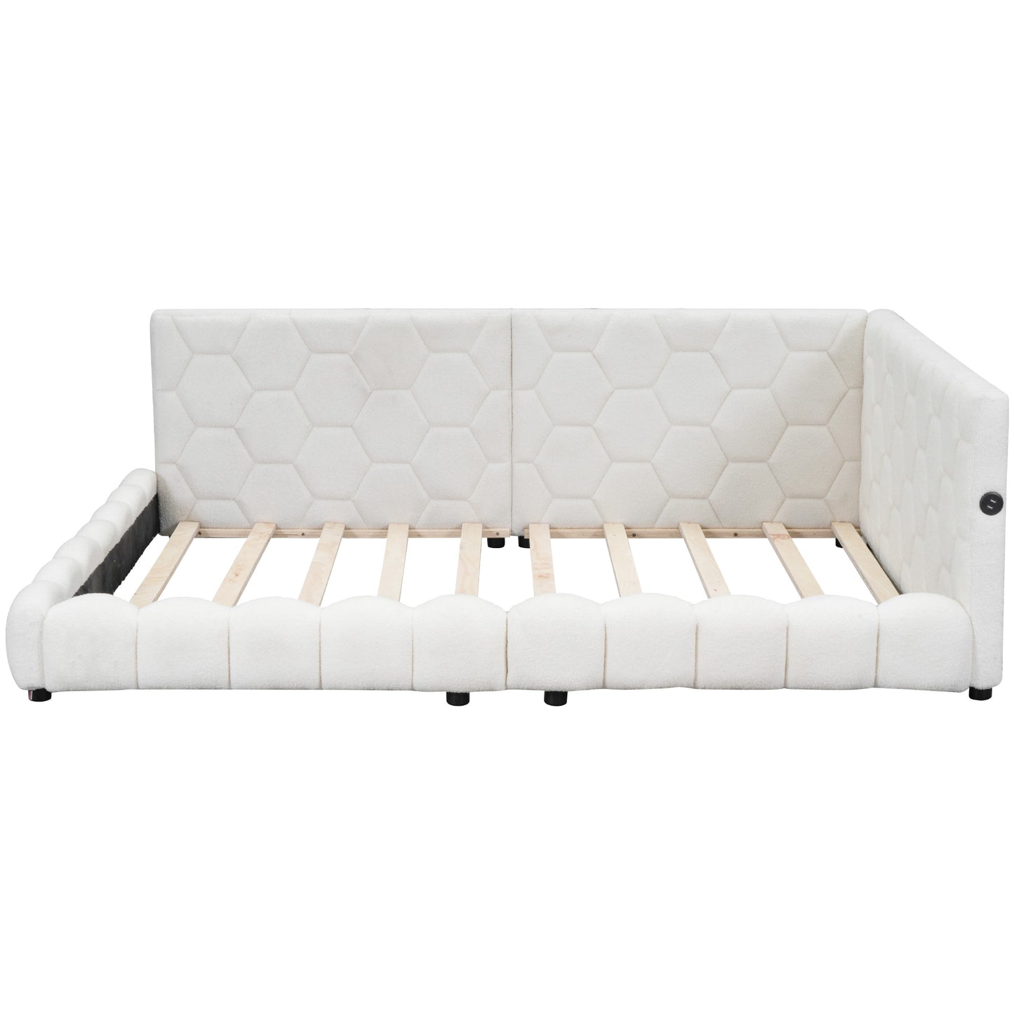 White upholstered daybed with hexagonal pattern