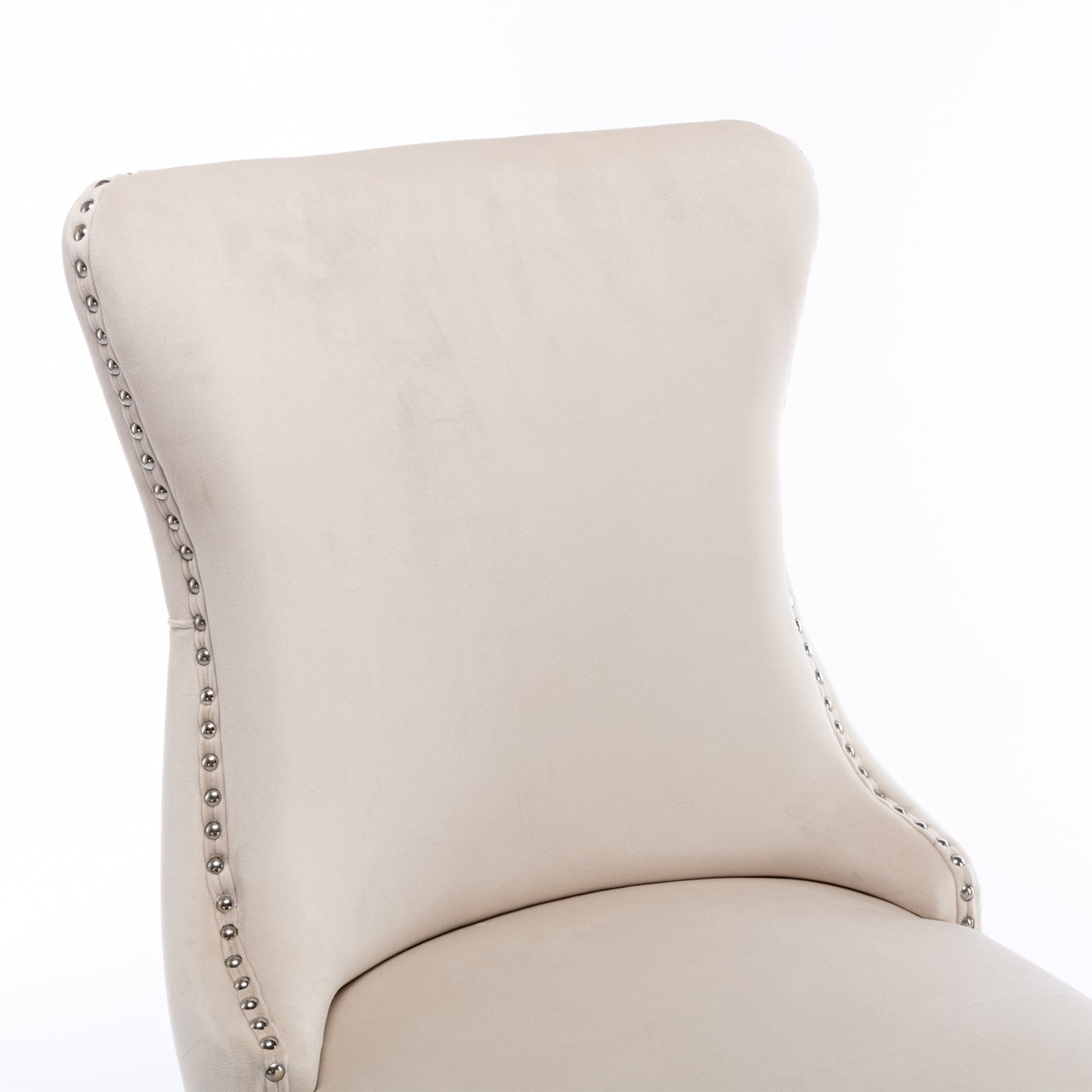 Cream velvet wingback dining chair with silver nailhead trim detail