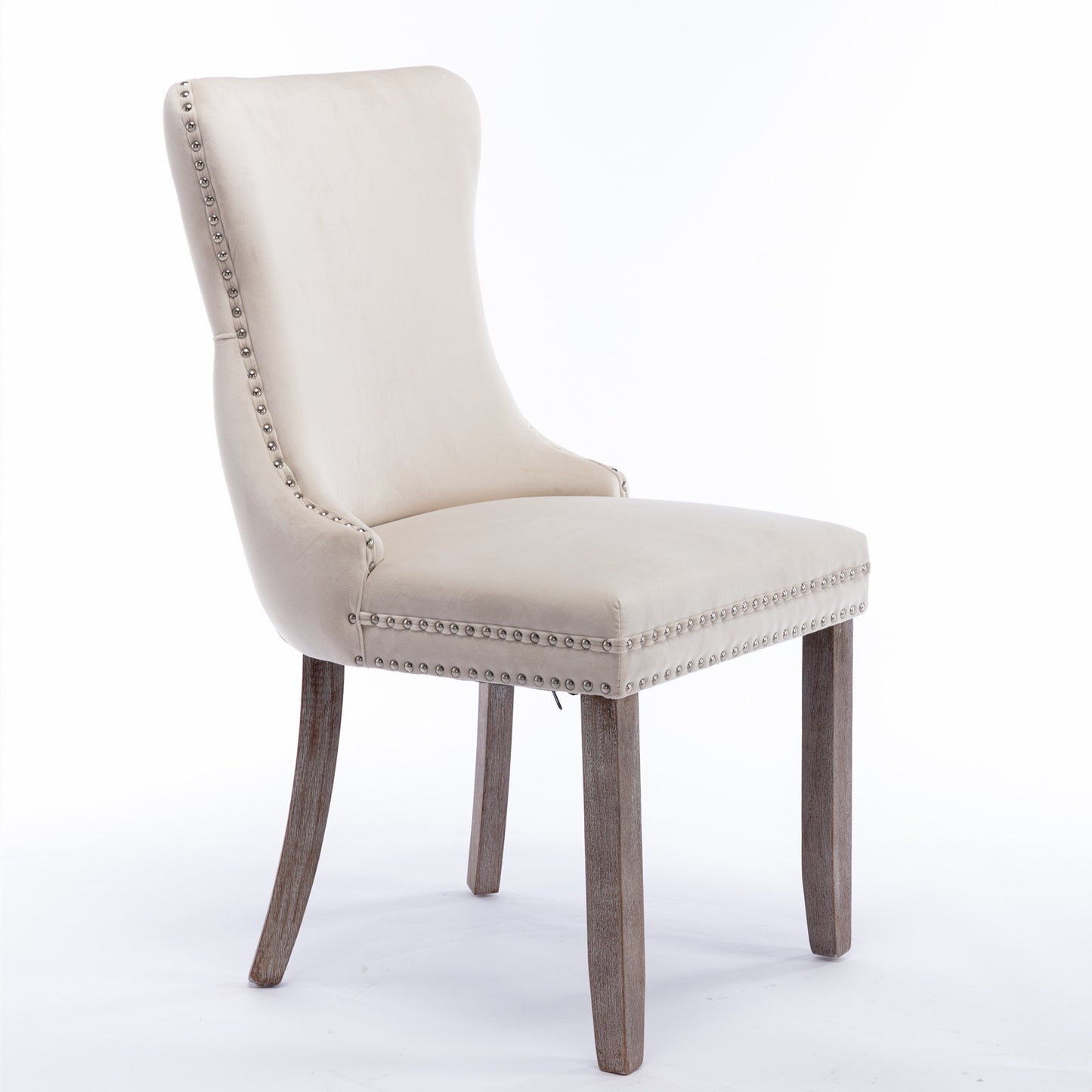 Cream velvet dining chair with silver nailhead trim and wood legs