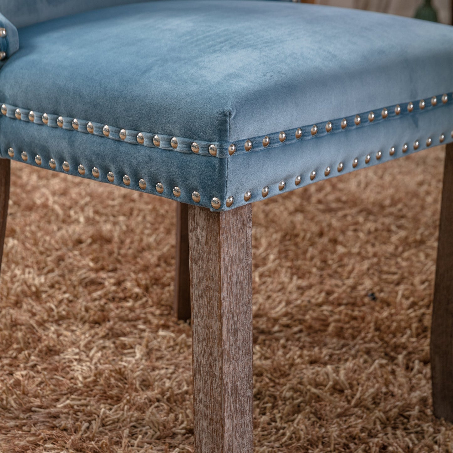 Blue velvet armchair seat with silver nailhead trim