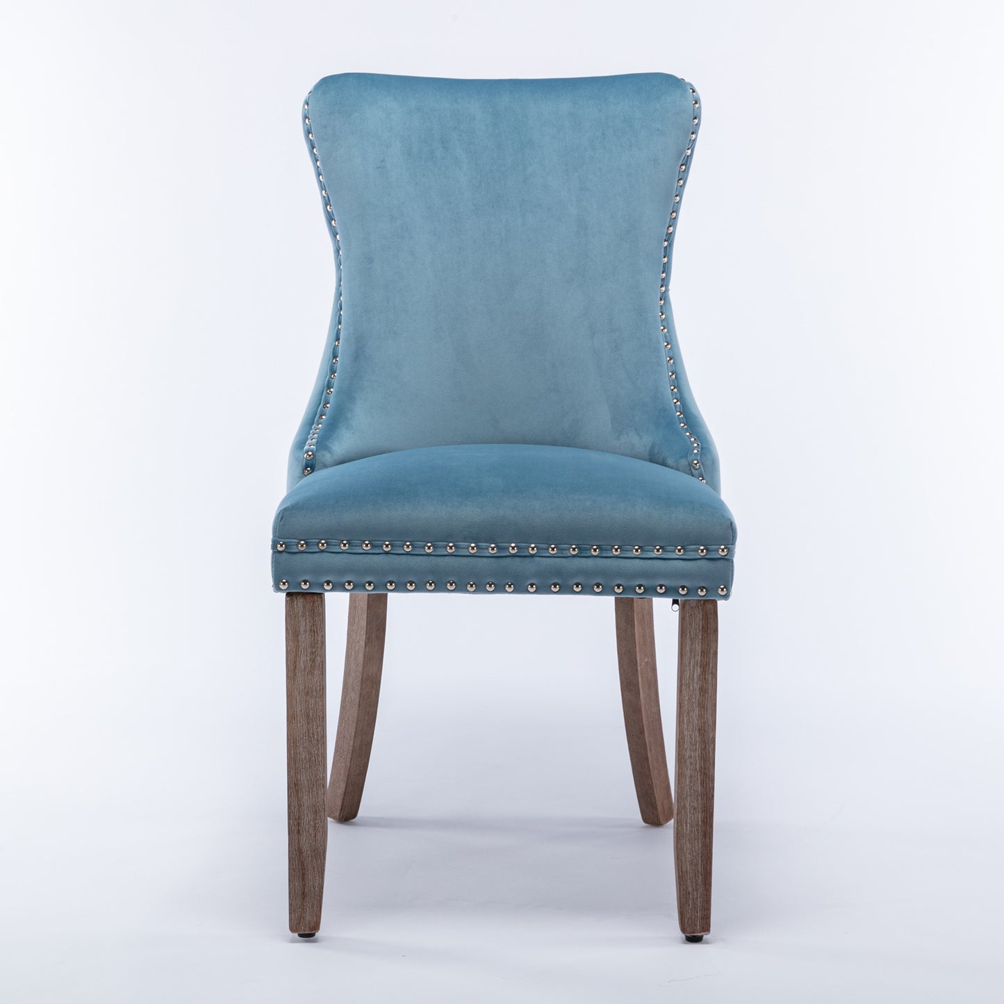 Blue velvet dining chair with silver nailhead trim and wooden legs