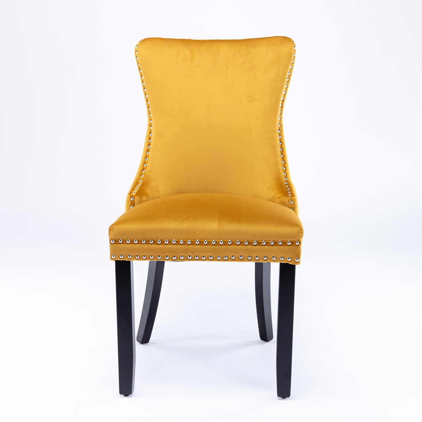 Mustard yellow velvet dining chair with silver nailhead trim and black legs