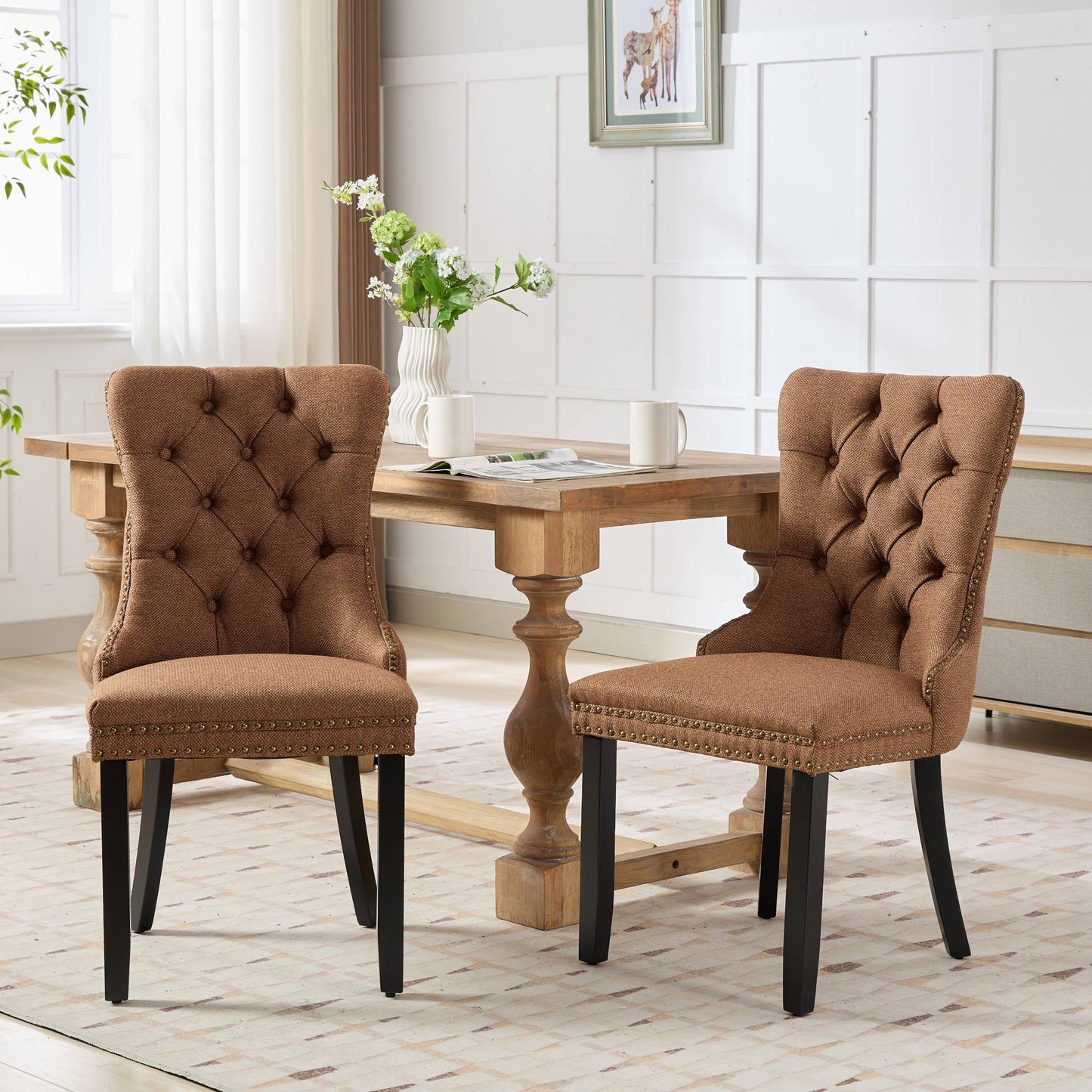 Brown tufted dining chair with brass nailhead trim