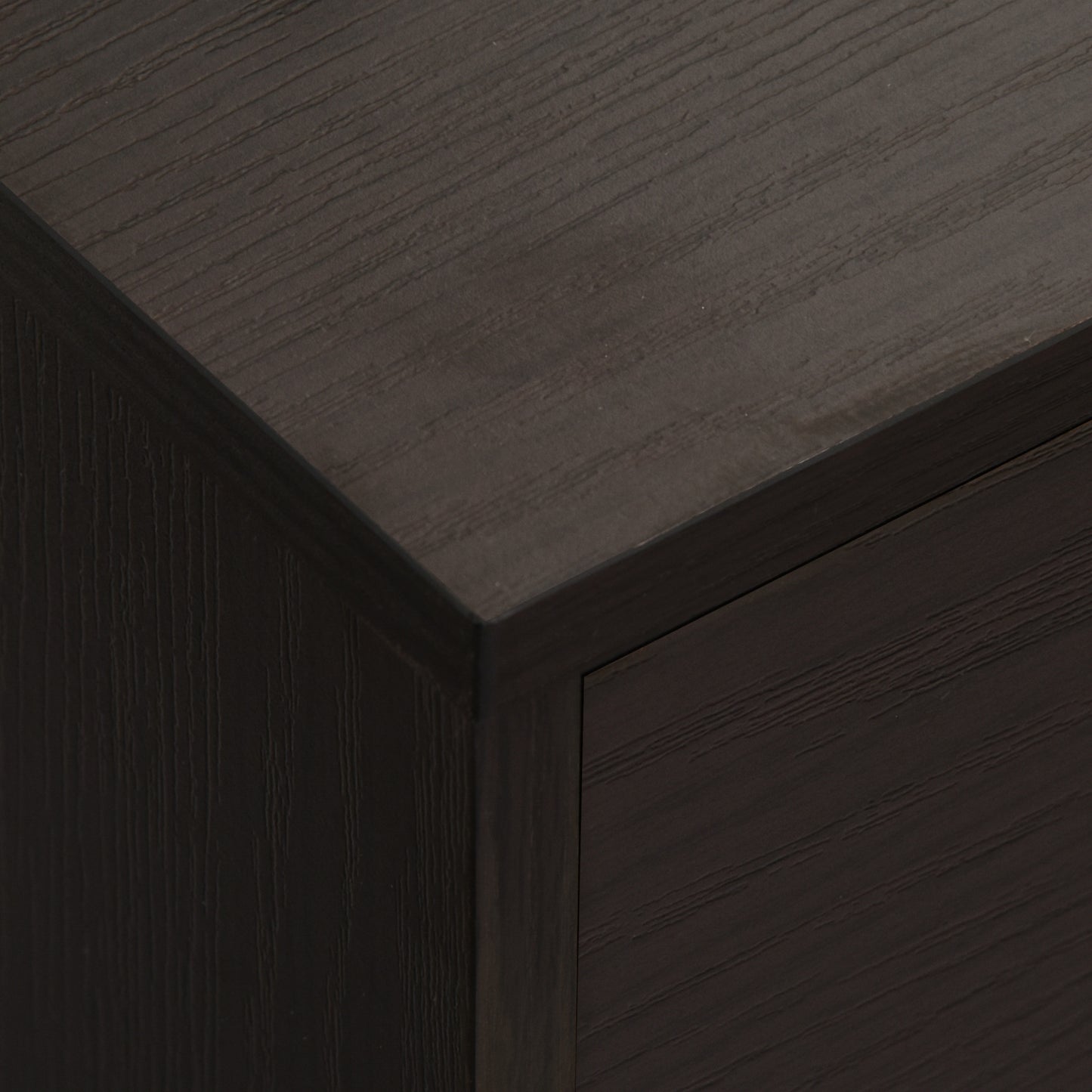 Dark oak veneer dresser detail with clean lines