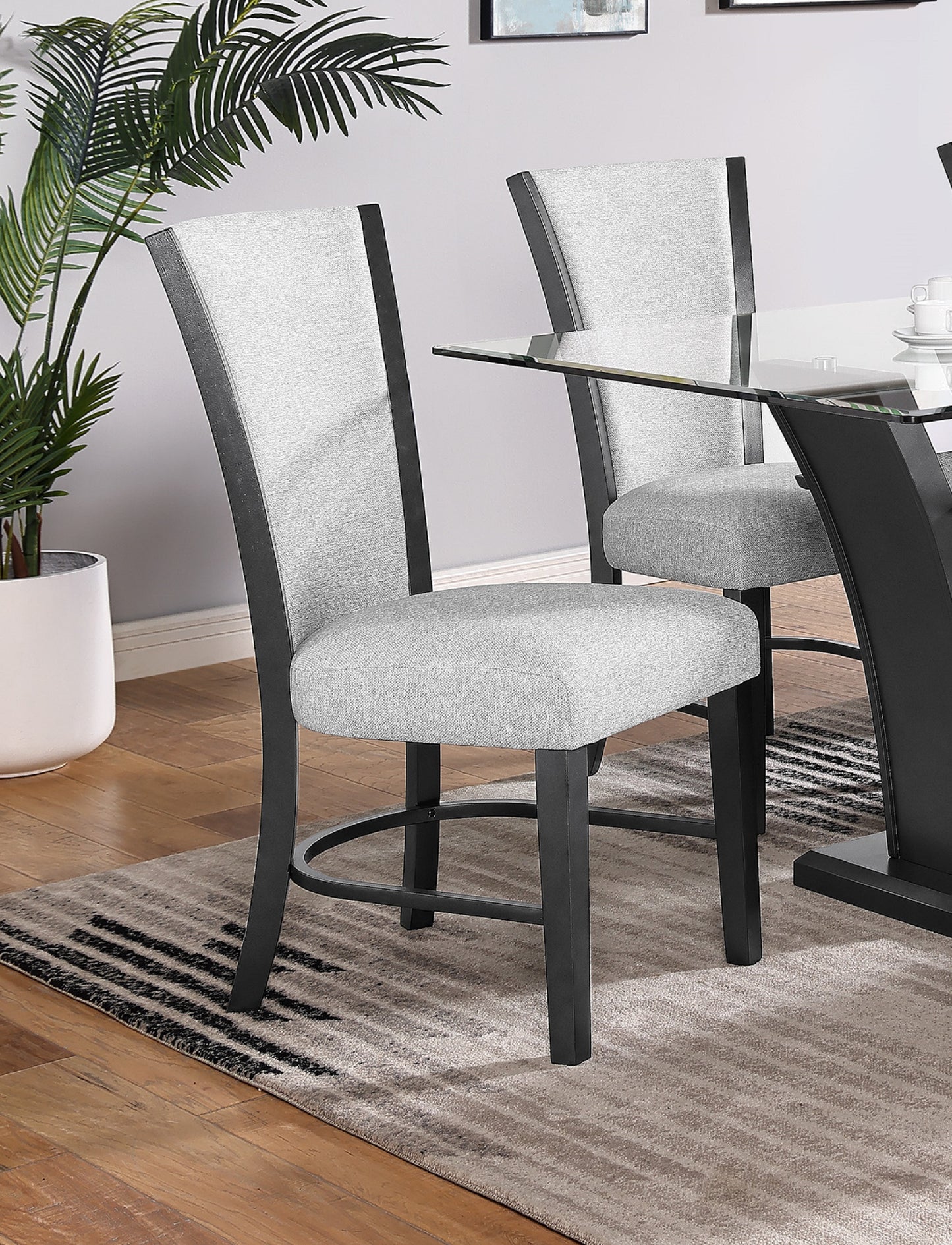 Light gray upholstered bar stool with dark wood legs