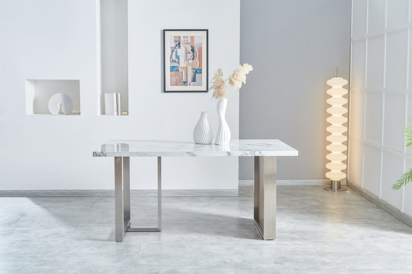 Rectangular white marble dining table with brushed metal legs