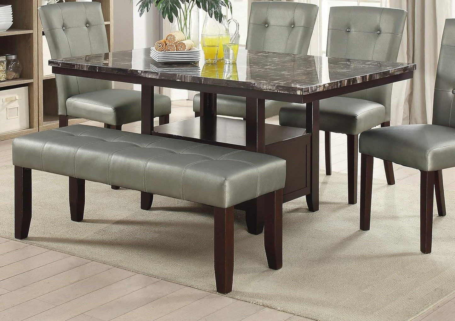 Marble top dining table with tufted grey faux leather chairs and bench