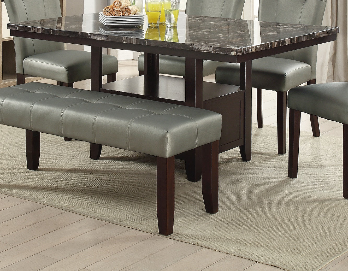 Tufted grey faux leather dining bench with dark wood legs