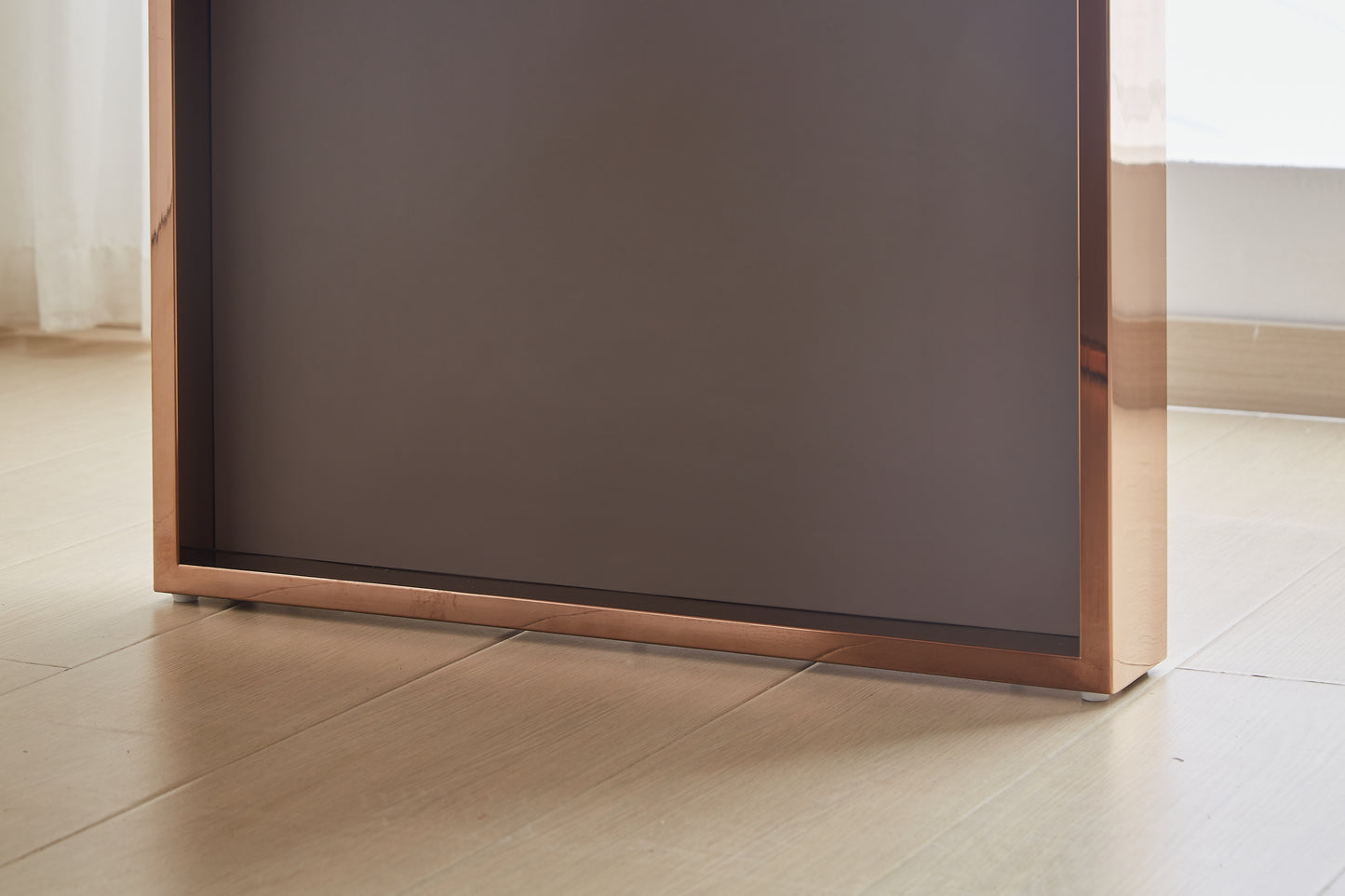 Modern copper framed tray with dark gray insert