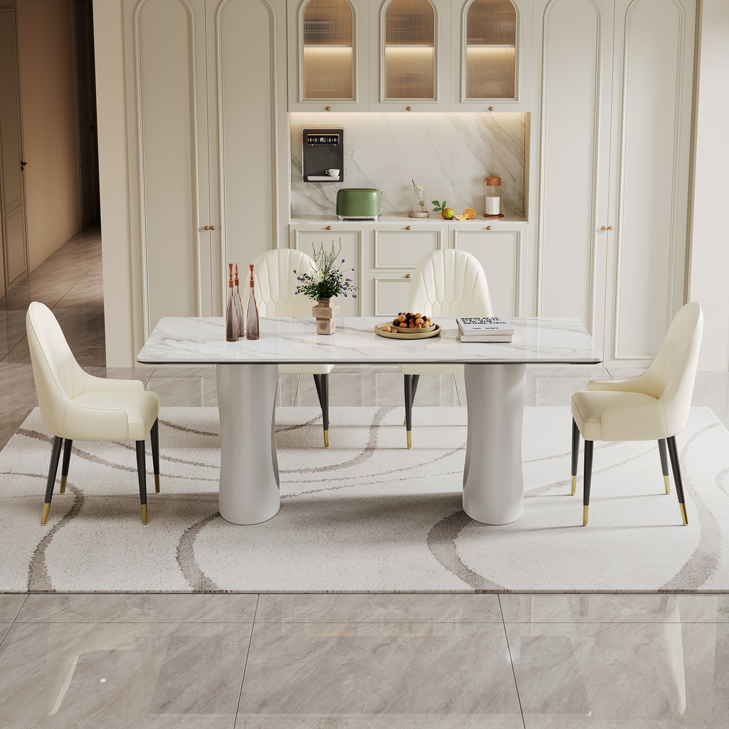 Marble dining table with cream upholstered chairs