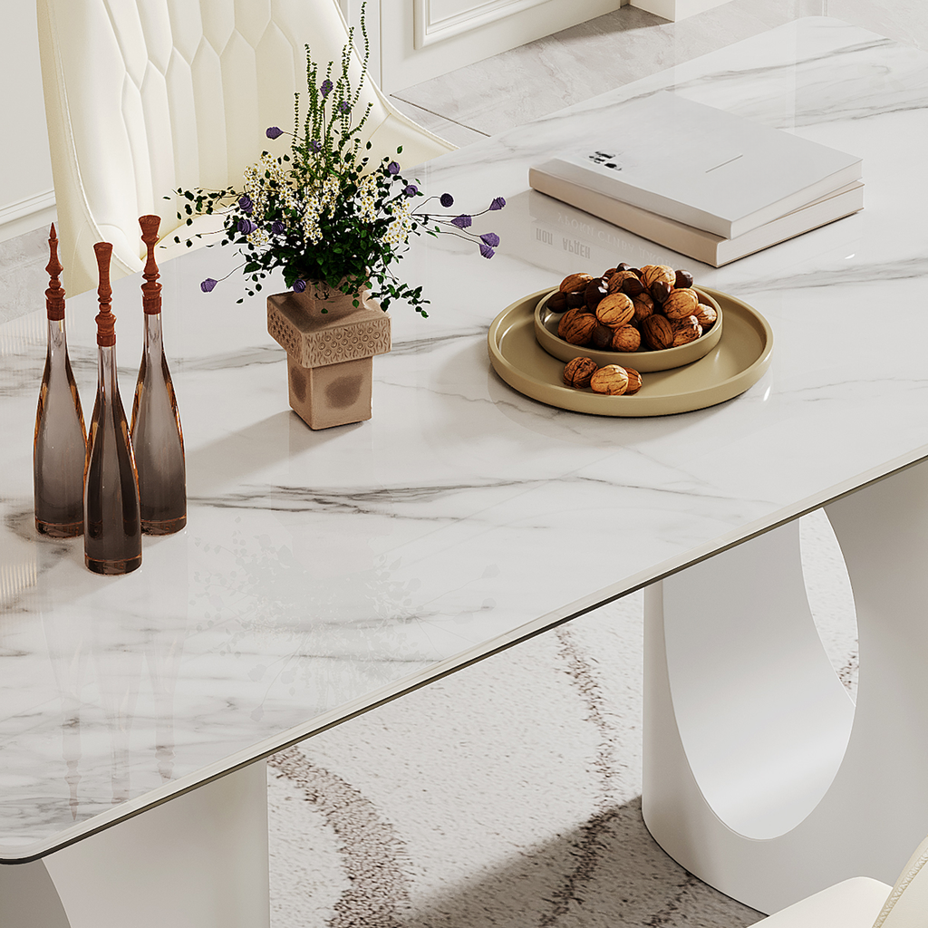 White marble dining table with elegant vase and walnuts