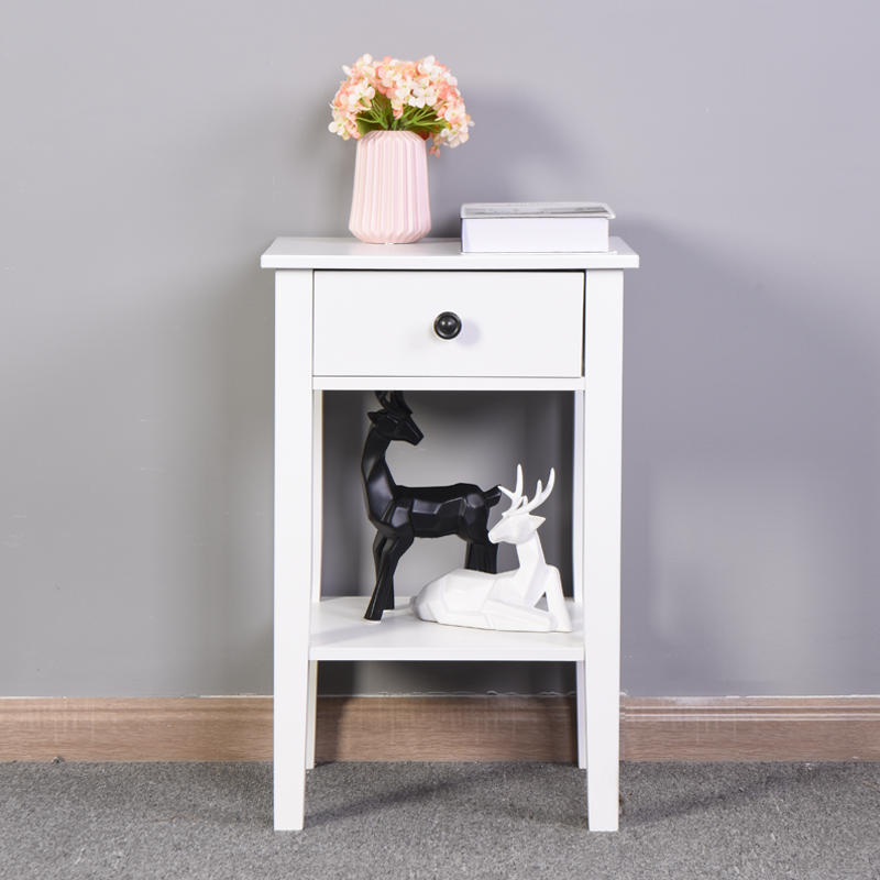 White wooden nightstand with black drawer pull and open shelf