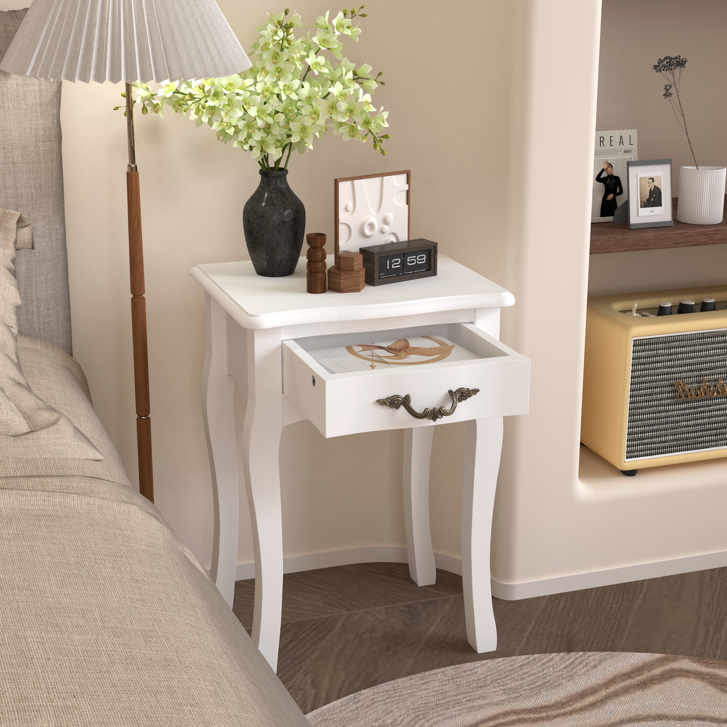 White wooden nightstand with ornate drawer pull and open drawer showing jewelry