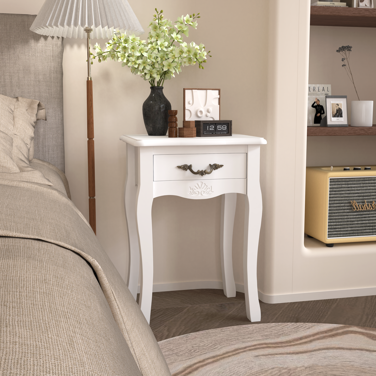 Classic white nightstand with ornate drawer pull and carved detail