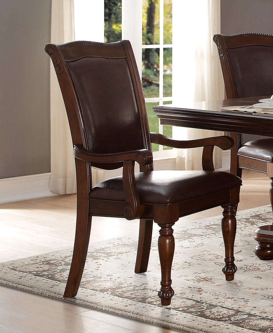 Elegant dark brown leather upholstered arm chair with carved wooden frame