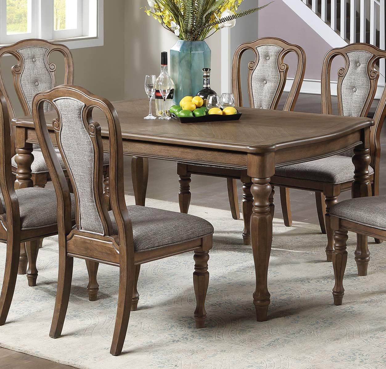 Dark oak dining table with upholstered chairs