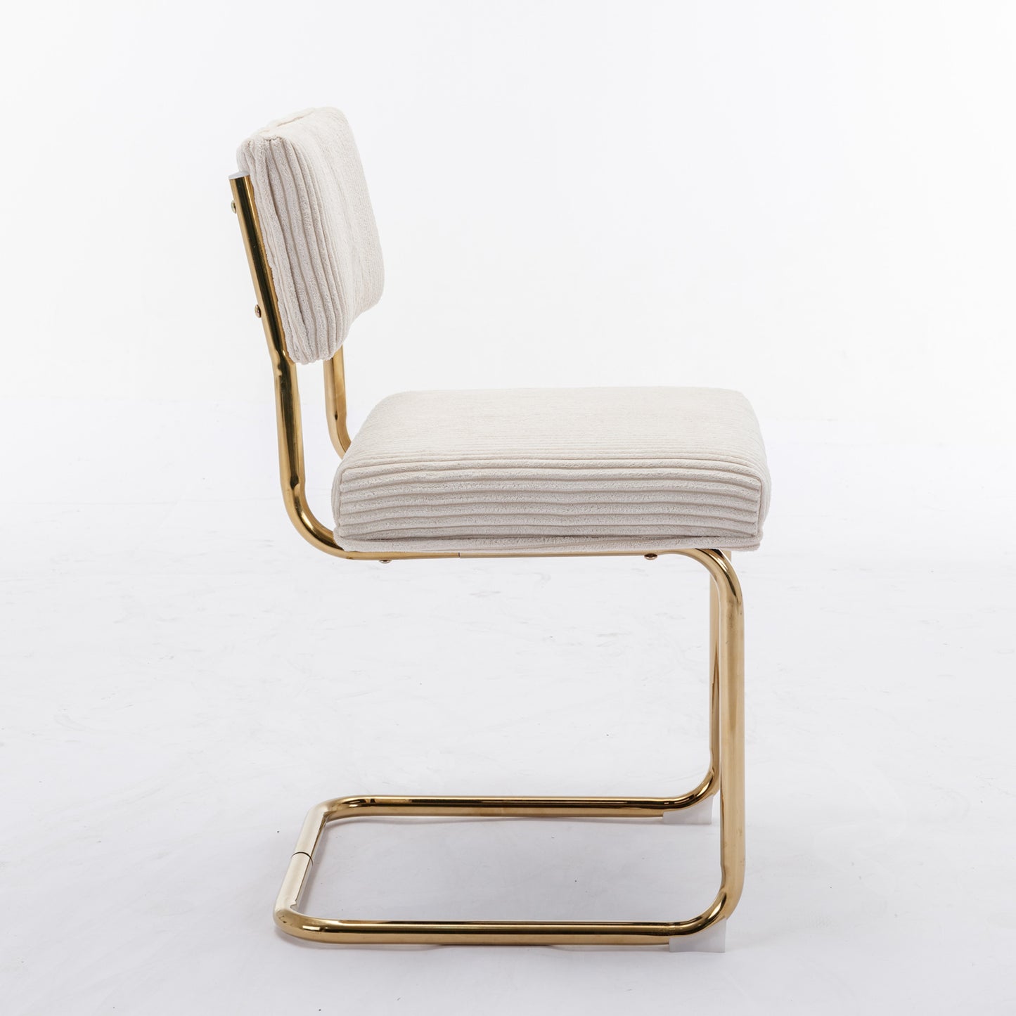 Cream corduroy dining chair with gold cantilever base