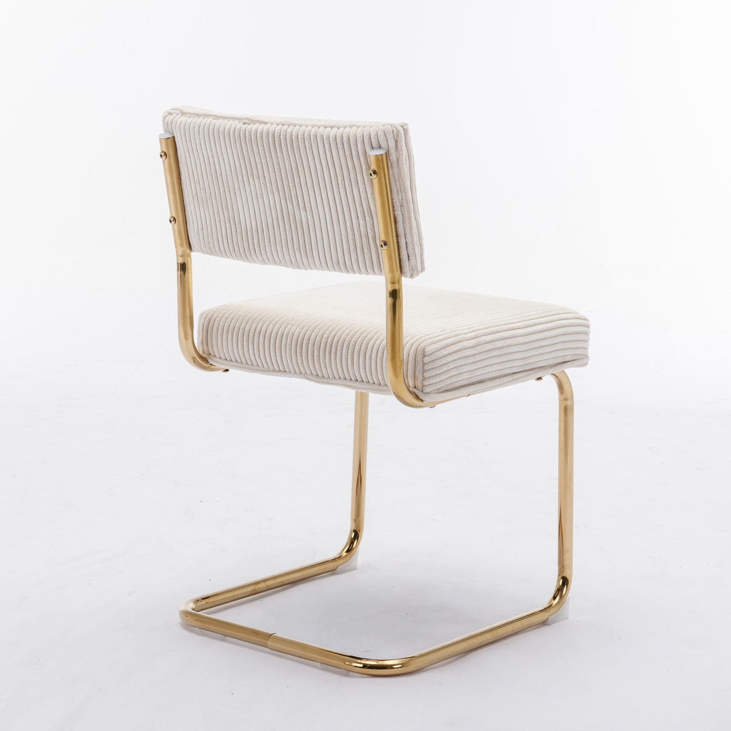 Cream corduroy accent chair with polished gold frame