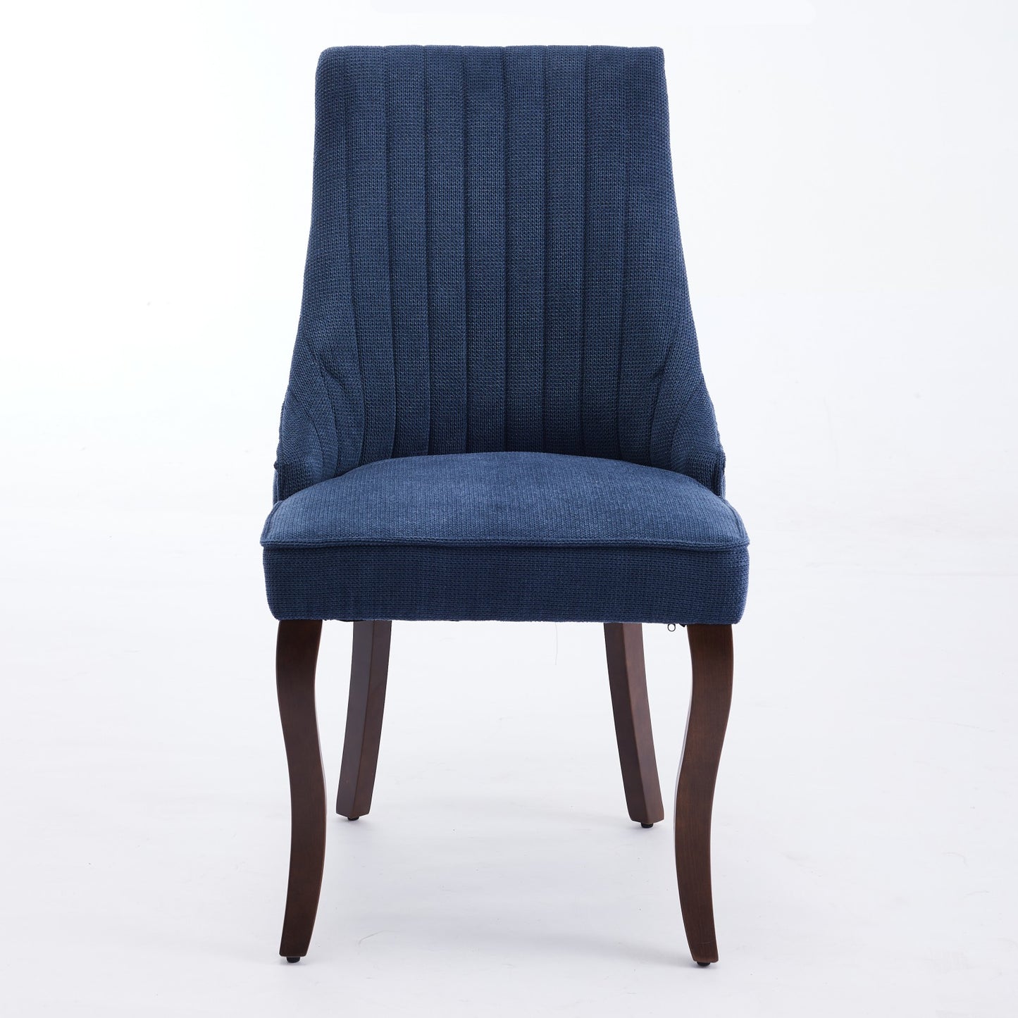 Navy blue upholstered dining chair with vertical channel tufting and dark wood legs