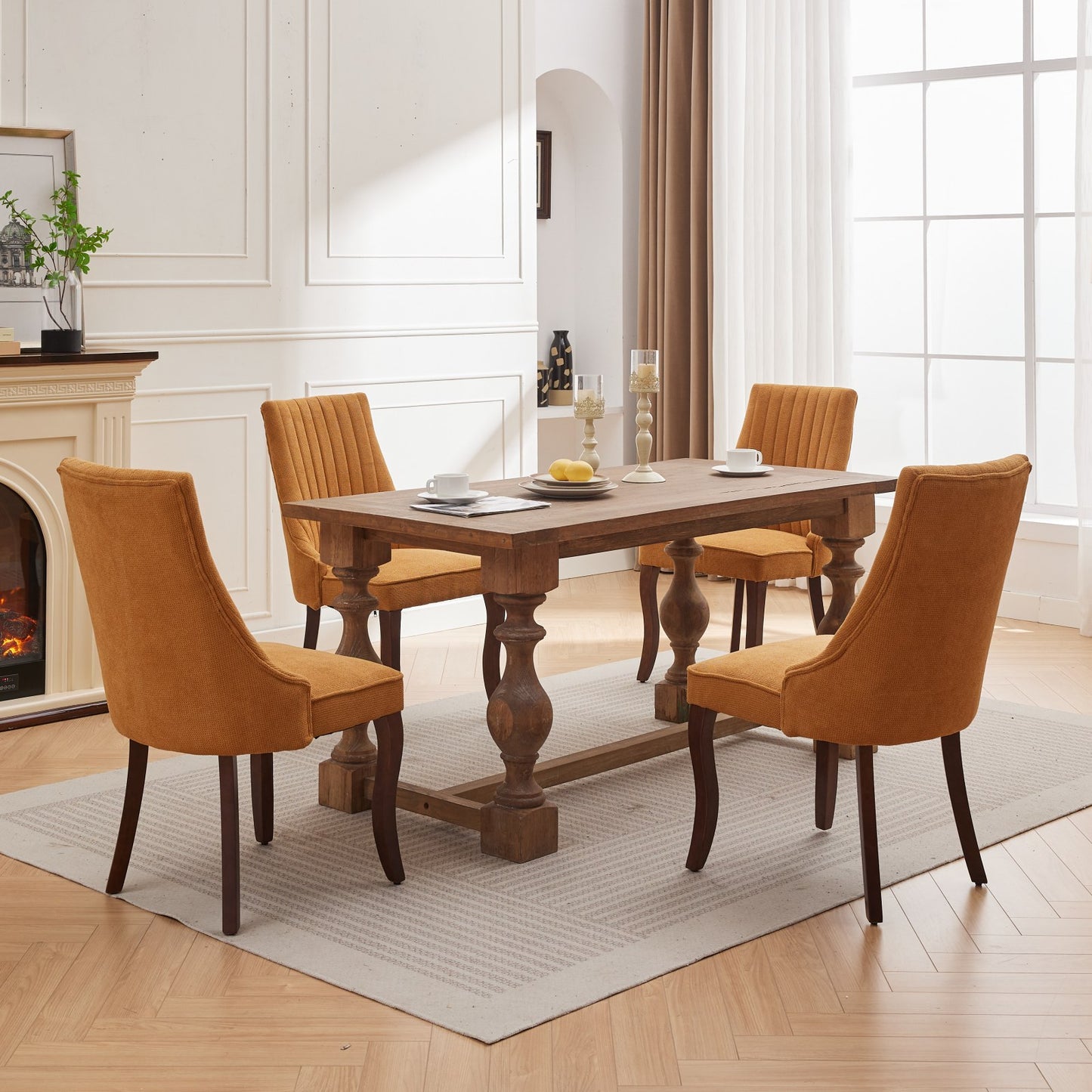 Orange upholstered dining chairs around a rustic wooden dining table