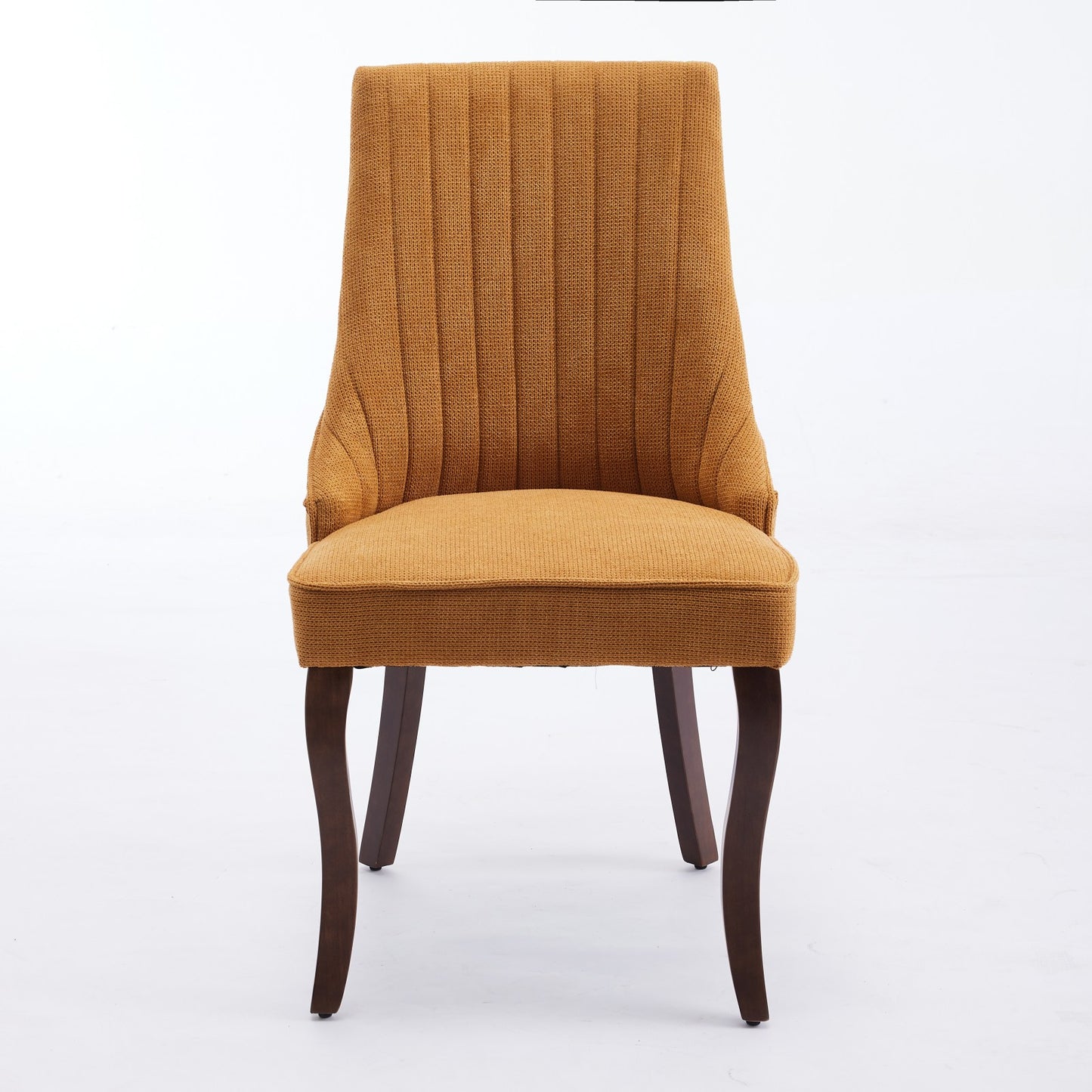 Orange upholstered dining chair with vertical channel tufting and dark wood legs