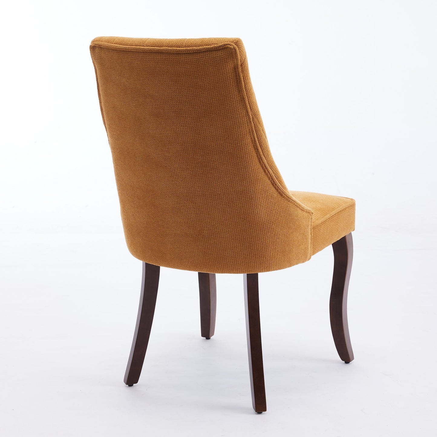 Brown upholstered dining chair with elegant curved wooden legs