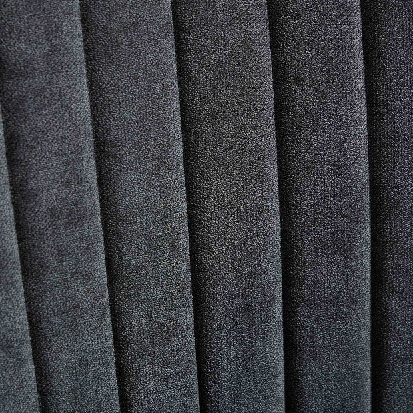 Dark grey channeled upholstery fabric texture