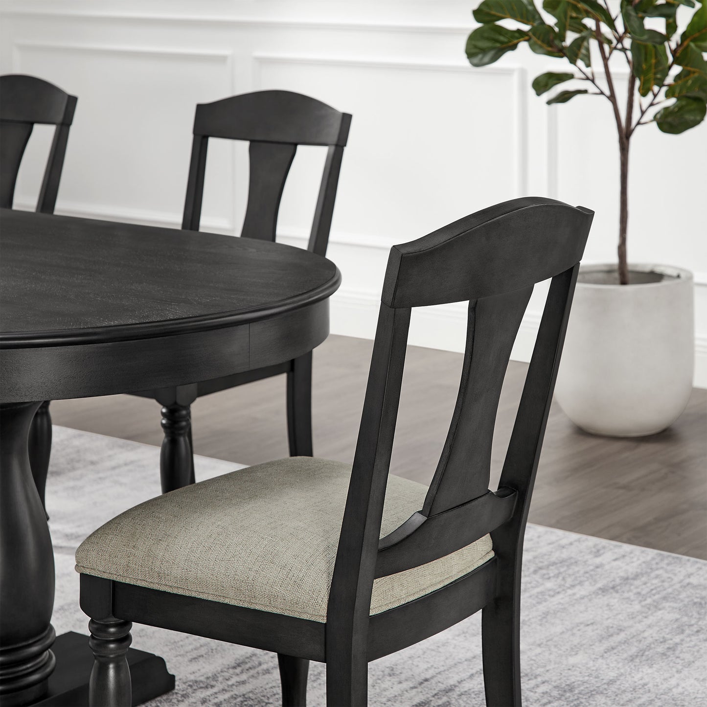 Dark gray wooden dining chair with upholstered seat