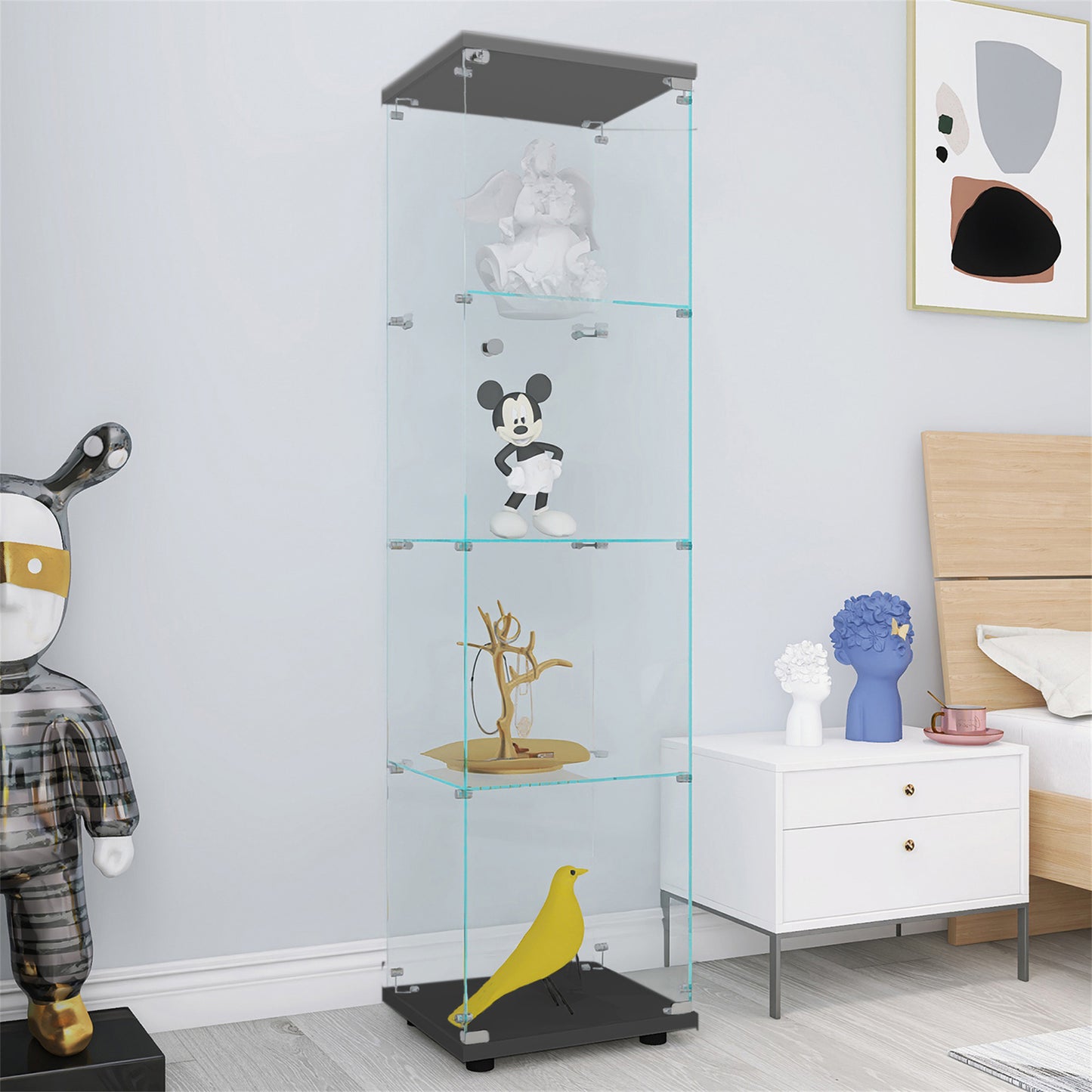 Modern glass display cabinet showcasing angel figurine Mickey Mouse and jewelry tree