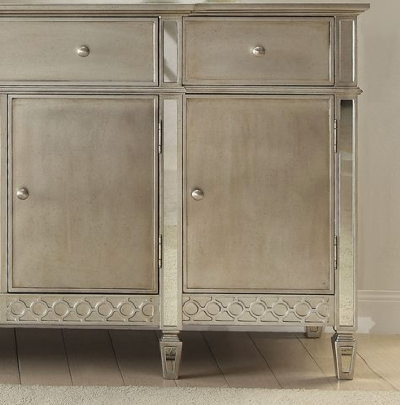 Antique silver accent cabinet with mirrored inlays and decorative trim