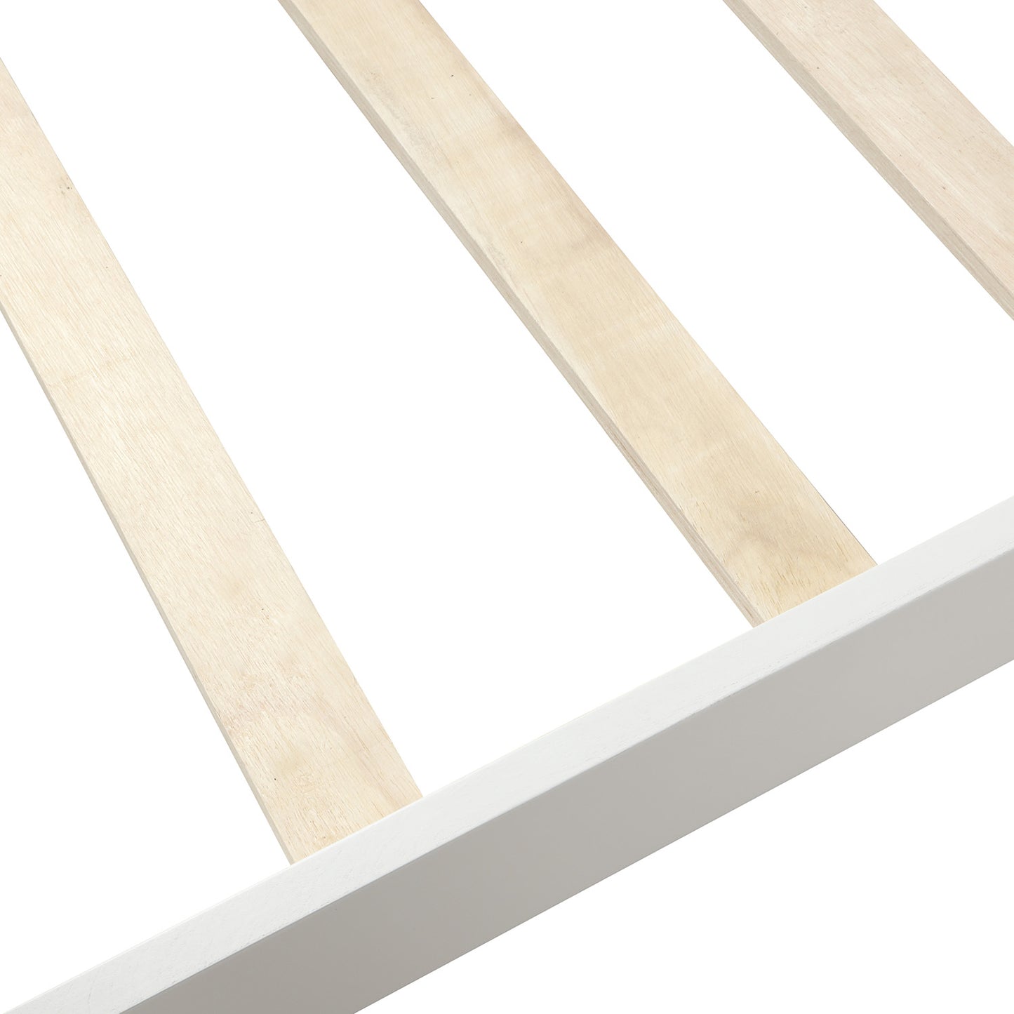 Closeup of natural wood slats on a white bed frame