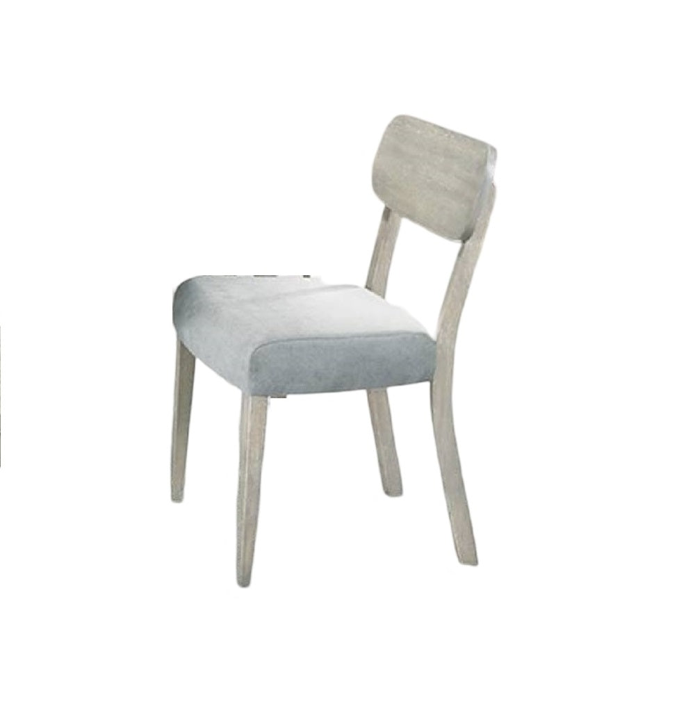 Light grey upholstered chair with a distressed wood frame